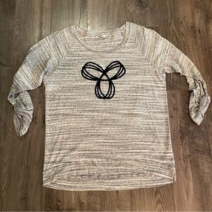 TNA shirt 3/4 length sleeves large logo longer fitting tunic